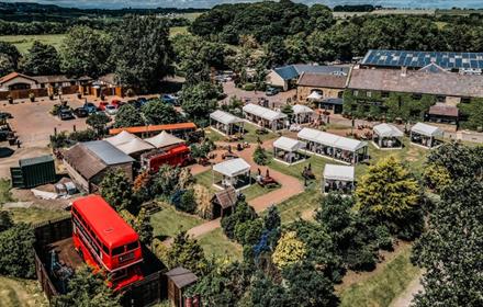 Aerial images showing a bus and buildings