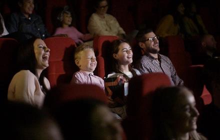 Family watching a movie at Cineworld.