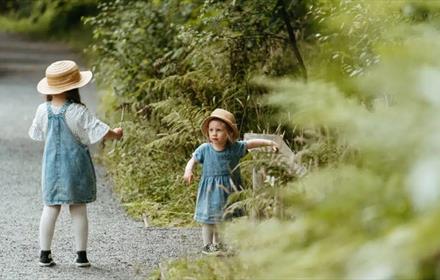 Two children walking the trail