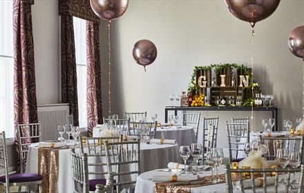 Dining room decorated for festive dining.