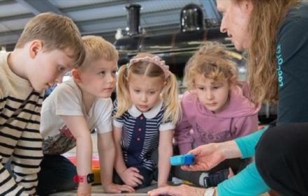 A group of children taking part in Easter activities at Locomotion