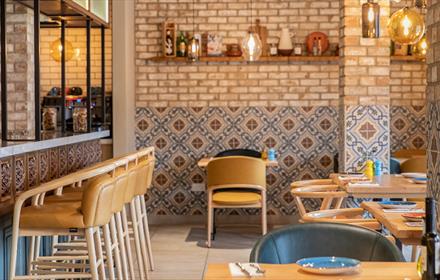 El-Castillo Tapas Restaurant in Bishop Auckland, mosaic tiled walls, seating and tables