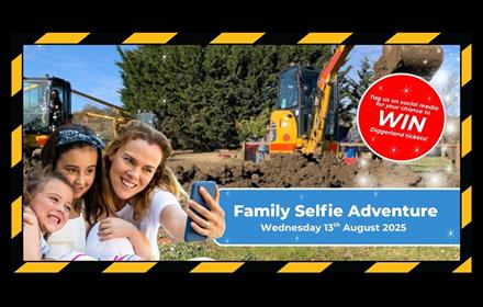 A family taking a selfie at Diggerland