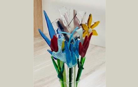 Fused glass flowers in a vase