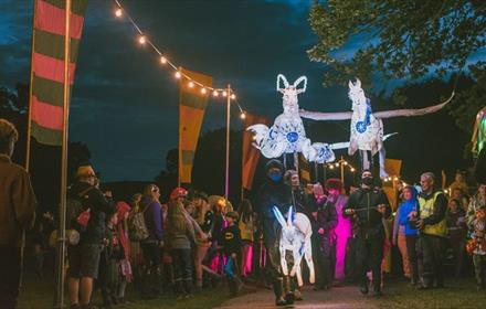 Illuminated puppets and spectators at The Glittering North Raby Castle