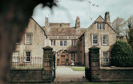 View of the front exterior of the Manor House Hotel