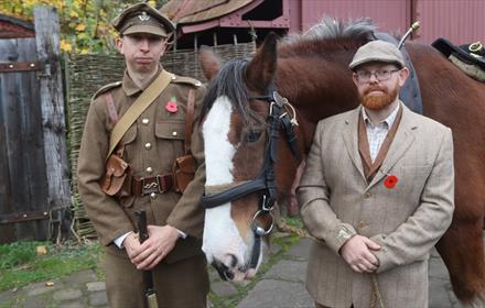 Two people in military uniforms - Remembrance Sunday
