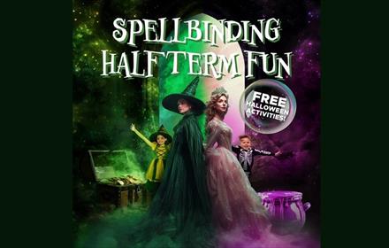 Two women dressed as characters from Wicked, two children dressed in Halloween costume with the wording Spellbinding Half Term Fun.