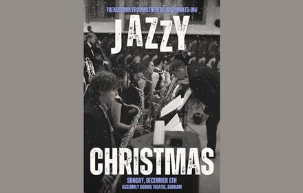 Black and white image of an orchestra with the wording Jazzy Christmas