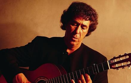 Juan Martin playing the guitar