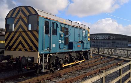 Image of carriages outside Locomotion.