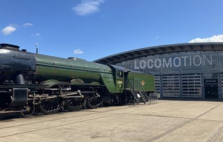 Locomotive outside of Locomotion's Collection Building