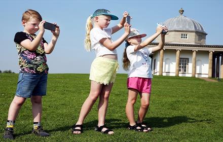 Three children at Hardwick Park using App