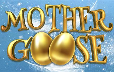 Mother Goose logo, written in gold with the Os shaped as golden eggs