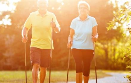 Two people walking in Raby Castle Park