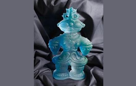 Modern Japanese bluish glass sculpture with a design based on ancient form.