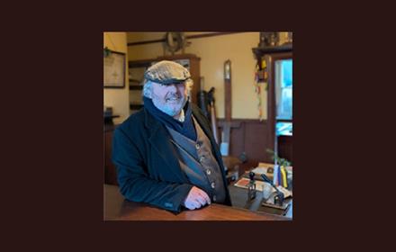 A man dressed in Collier's clothing at Beamish Museum