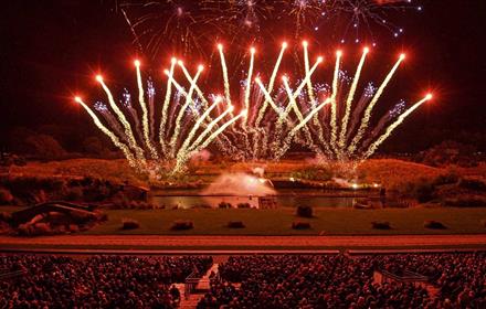 Audience watching the spectacular fireworks display from the arena: Pyromusical 2024
