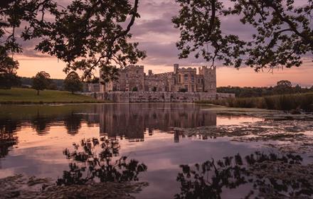 Sunset over Raby Castle, view from the lake