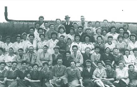 Black and white photo of a crowd of remarkable women