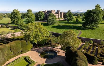 Raby Castle gardens with castle in background