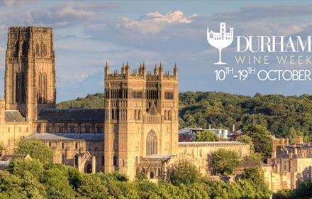 Text reads, 'Durham Wine Week 10th - 19th October 2025'. Poster of Durham Cathedral  and surrounding woodland.