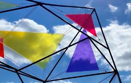 Colourful, geometric, sculptural installation by Stuart Langley.