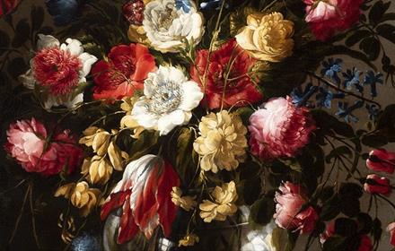 Image of Spanish art showing a vase of yellow, red, white and blue flowers.