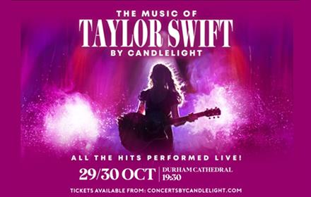 Taylor Swift performing on stage at a concert