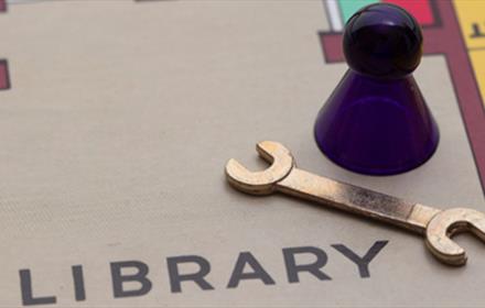 The game Cluedo. Board showing a wrench in the Library.