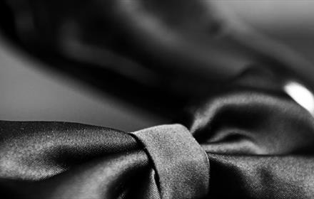 Black and white photo of a bow