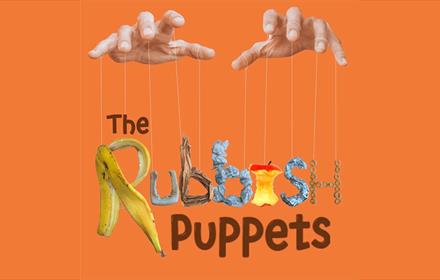Hands with strings attached to fingers and letters on each string which spell 'The Rubbish Puppets'