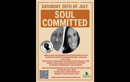 Black and white photo of a man and woman  smiling for the 'Soul Committed' event