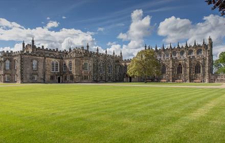 Image of Auckland Castle's exterior on a sunny day
