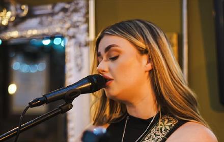 Close-up of Jodie Fitzgibbon performing