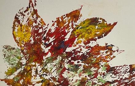 Colourful print of autumn leaf shapes