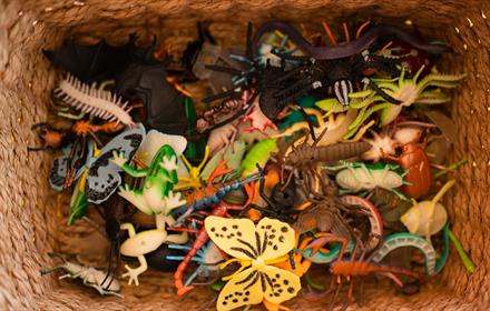 Basket of artistic insects