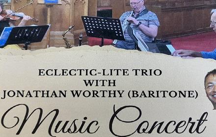 Trio of musicians performing - Eclectic-Lite Trio with Jonathan Worthy (Baritone).