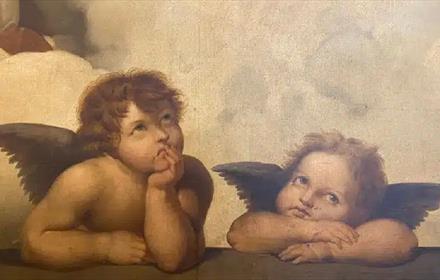 Two young angels looking upwards