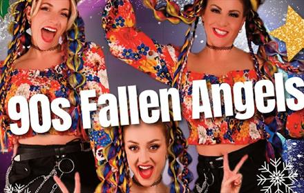 3 performers with colourful braids and clothing. 90s Fallen Angels.