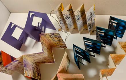 Handmade folded books in a variety of forms by artist Maggie Hickman Smith