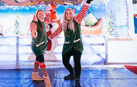 Two smiling elves.
