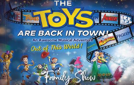 Characters from Toy Story, on a poster advertising 'The Toys are Back in Town' musical adventure family show.