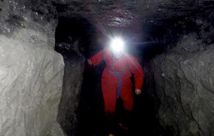 Adventurer exploring a mine.