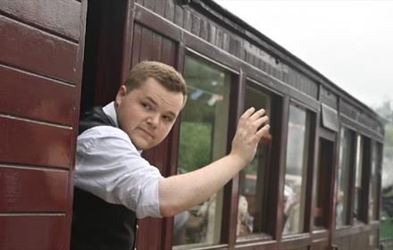 Someone waving from the train at Tanfield Railway.