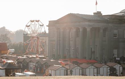 Christmas Fayre at Wynyard Hall with a Ferris Wheel and market stalls.