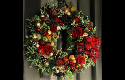 Handmade Christmas Wreath made with gold baubles, red ribbons, pine cones and festive greenery - Thyme to Bloom Workshop