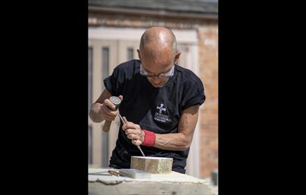 Expert demonstrating Stone Carving