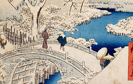 Edo Period Woodblock Print depicting a wintery scene in which people are walking over a bridge the crosses a river.
