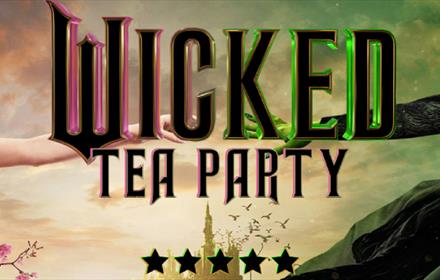 Wicked Tea Party. Wicked Witch of the West reaching out to Glinda the Good.